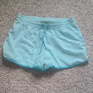 COLUMBIA WOMENS LIGHT BLUE WITH BLUE TRIM, RUNNING GYM SHORTS SIZE MEDIUM